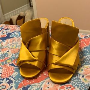 Mustard yellow pumps